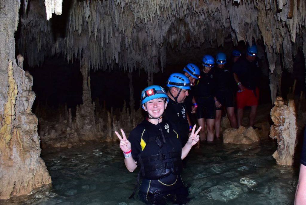 Rio Secreto Tour Group Holding Hands | Footsteps of a Dreamer